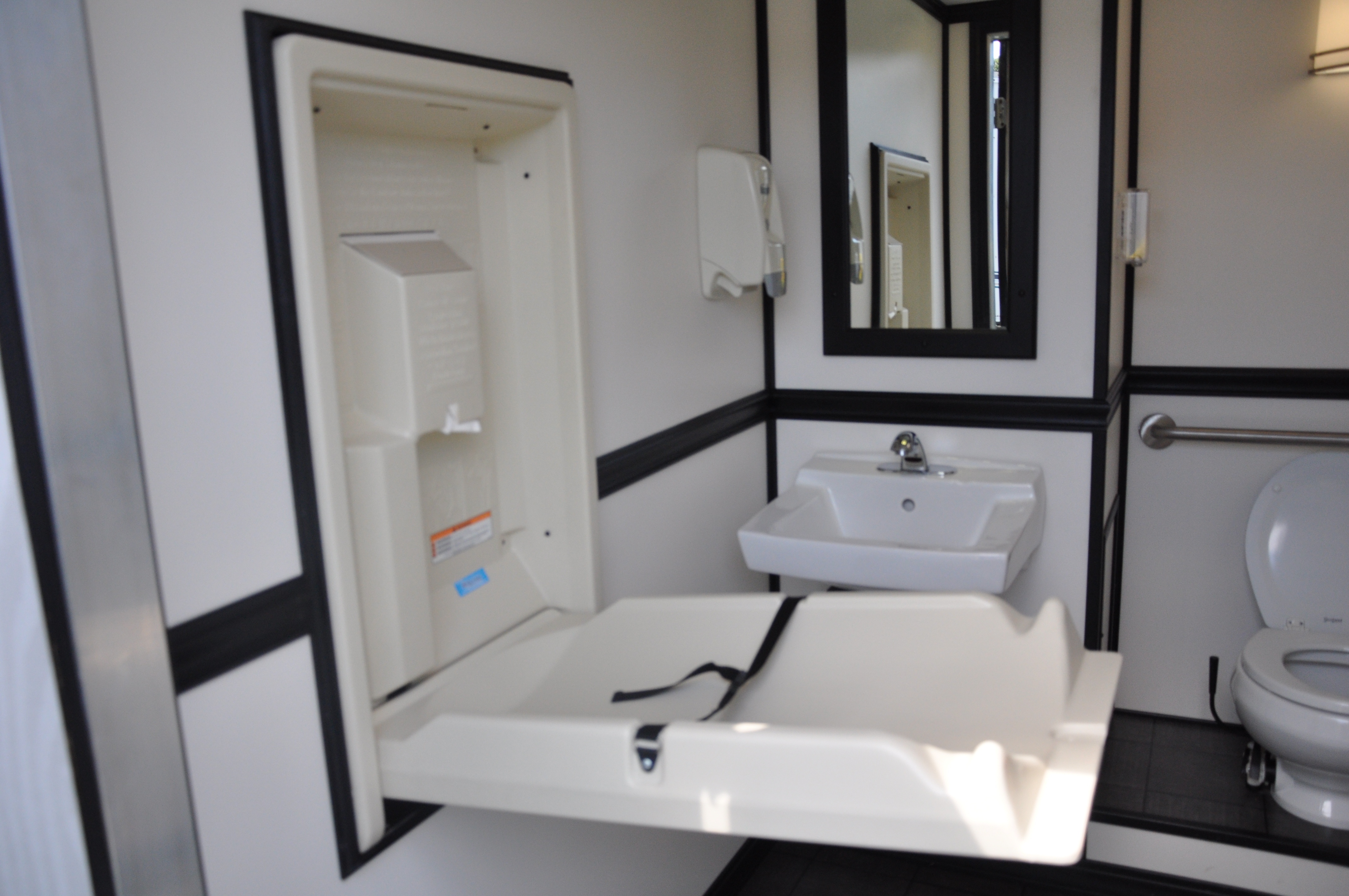 Crowd Pleasers restroom trailer with baby-care unit